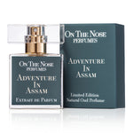 Front view of Adventure In Assam 15 ml perfume bottle with its box