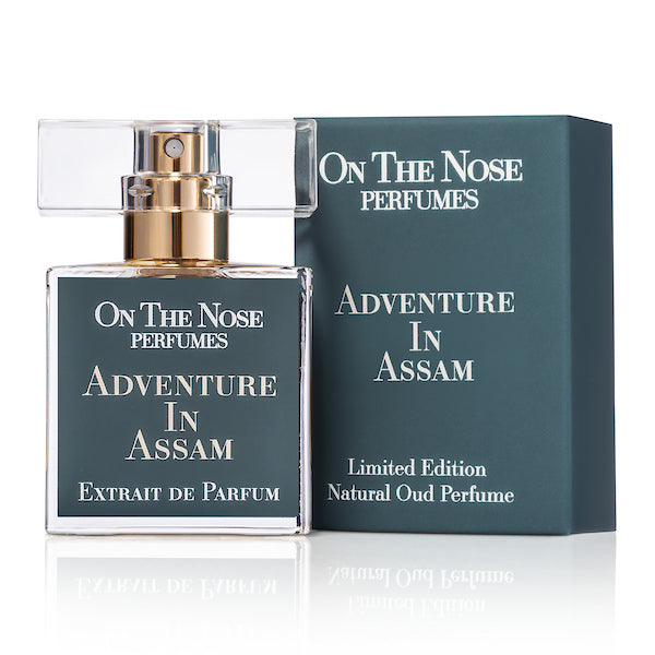 Front view of Adventure In Assam 15 ml perfume bottle with its box