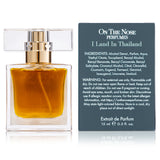 Back view of I Land In Thailand 15 ml perfume bottle and box